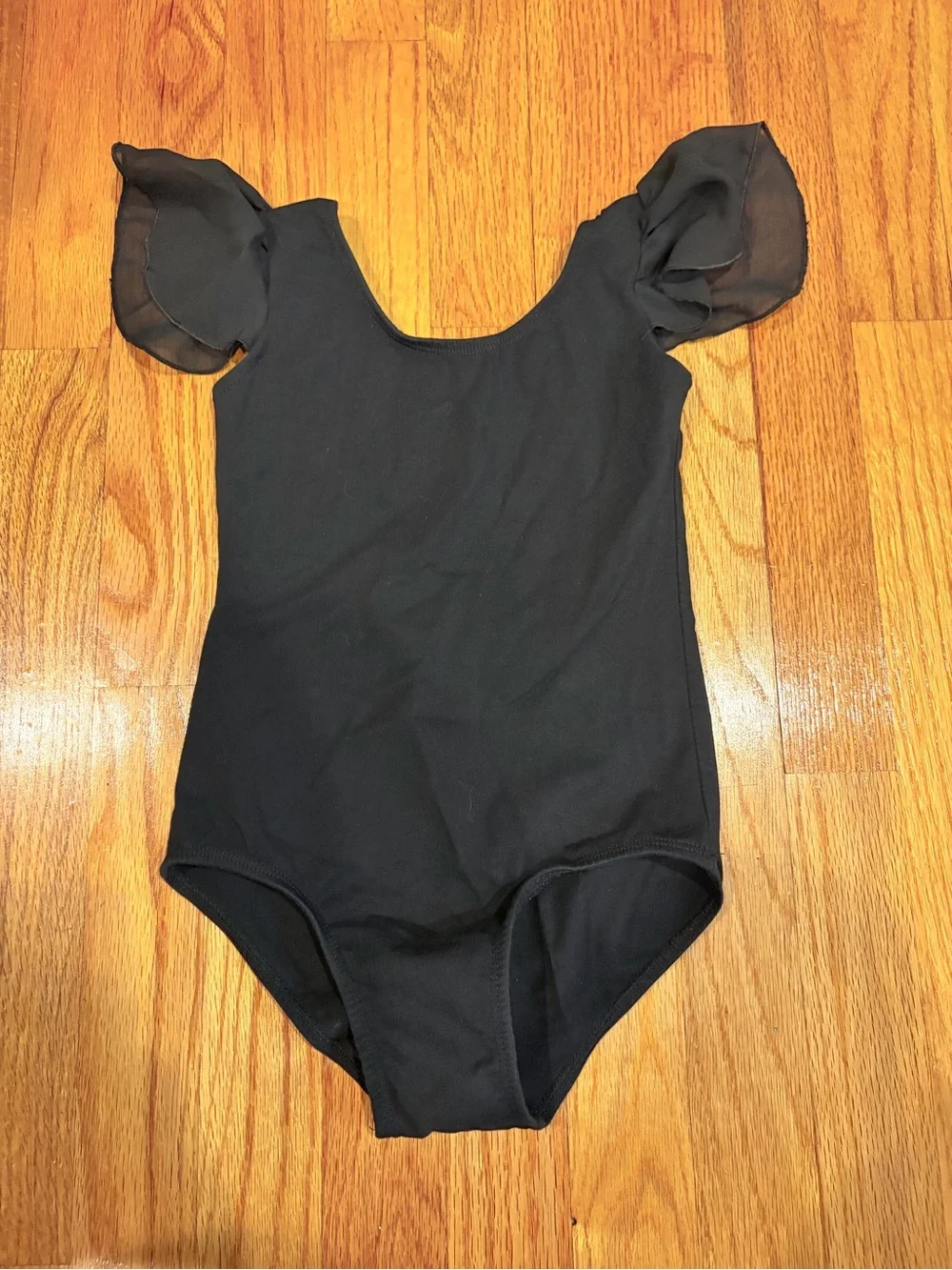 Black Kids One-Piece Bodysuit with Sheer Flutter Sleeves